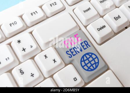 Writing note showing File Server. Business concept for device which controls access to separately stored data Different Colored PC keyboard key With A Stock Photo