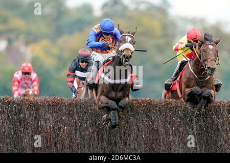 Pontresina ridden by Jonathan Burke (left) clear the last to win The Racing TV Handicap Chaseat Kempton Park Racecourse. Stock Photo