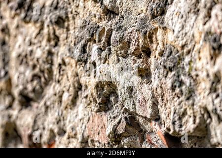 decorative exterior wall plaster with embossed surface, selective focus Stock Photo