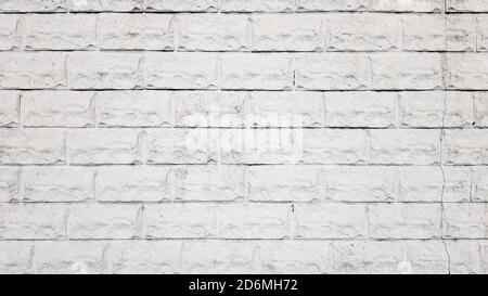 Modern white brick wall texture for background. Weathered abstract. White brick walls. Stone blocks. Horizontal architecture technologies. Wallpaper. Stock Photo