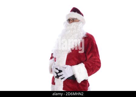 Senior man wearing a traditional Santa Claus costume holding his belly in both hands, side view. Isolated on white. Stock Photo