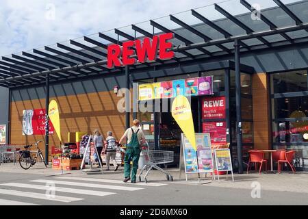 Entrance of a REWE supermarket Stock Photo