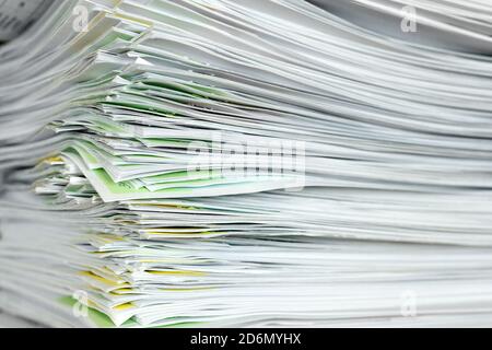 A stack of office papers on a table. Close up view. Selective focus. Stock Photo