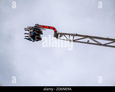 people upside down on spinning amusement ride Stock Photo