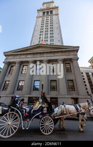 Tourists in a horse carriage ride, Custom House Tower, McKinley Square, Financial District, Boston, Massachusetts, USA Stock Photo