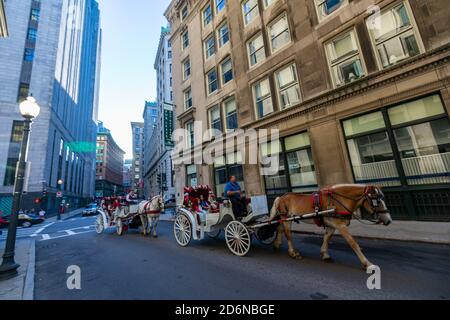 Tourists in a horse carriage in Financial District, Boston, Massachusetts, USA Stock Photo