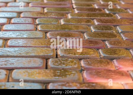 pink paving slab after rain for background Stock Photo