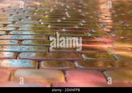 pink paving slab after rain for background Stock Photo