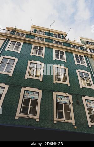 Lisabon/ Portugal-May 26th, 2017: Fascinating ceramic tiles facade of amazing Lisabon houses, creating colorful streets and tourist attractions Stock Photo