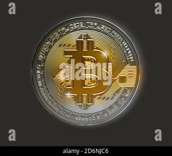 Bitcoin silver mockup 3D rendering turning to gold shining on dark gray background with clipping path for diecut to use in any backdrop Stock Photo