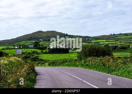 The beautiful landscape of West Cork, County Cork, Ireland. The road sign is for Crookhaven and Mizen Head. Stock Photo