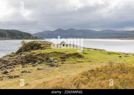 Loch Doon and the Galloway Hills in the far distance with a broody winter sky. Stock Photo