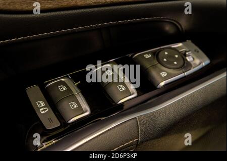 Window and mirror control panel in modern car Stock Photo