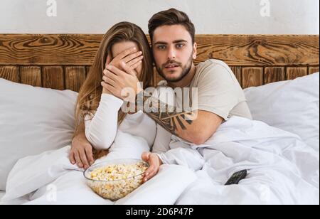 Human emotions, scary movie at home and spare time in evening Stock Photo