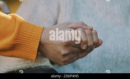 Old couple having romantic autumn day in forest. Hugging tree and smiling. High quality photo Stock Photo
