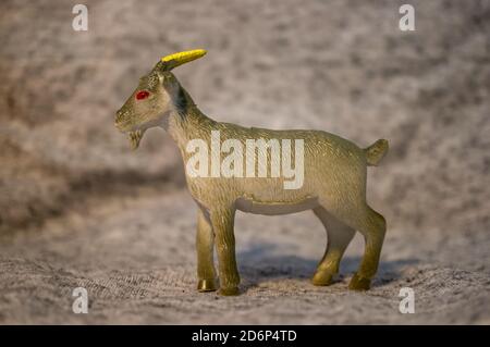 Closeup of a toy figurine of a goat Stock Photo Alamy