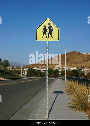 Wide angle view of school crossing sign Stock Photo