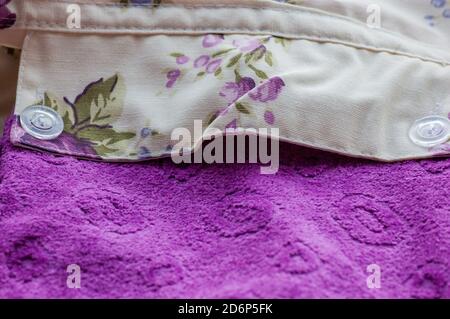 Fragment of colorful retro tapestry textile pattern with floral ornament useful as background. Floral textile or cloth Stock Photo