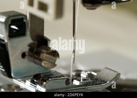 Sewing machine with focus on needle, shallow depth of field Stock Photo