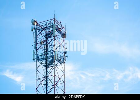 transmission tower built high under the blue Stock Photo