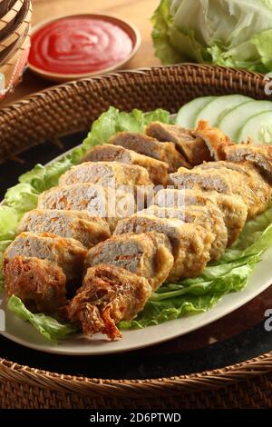 Asian food deep fried spring rolls with sauce Stock Photo