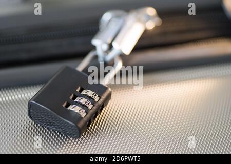 small Luggage lock, magnetic closure combinations, safety on the road Stock Photo