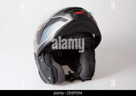 Bordeaux , Aquitaine / France - 10 10 2020 : shoei new gray black shiny motorcycle flip up helmet with modern flip-front isolated background Stock Photo