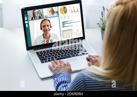 Headshot screen application view of diverse multiracial employees have work web conference using modern platform, smiling multiethnic colleagues talk Stock Photo