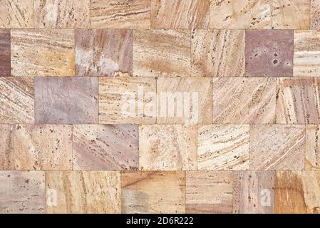 Armenian volcanic tuff wall texture, surface of natural building stone, product of volcanic emissions Stock Photo