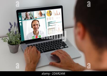 Headshot screen application view of diverse multiracial employees have work web conference using modern platform, smiling multiethnic colleagues talk Stock Photo