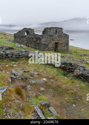 Ruins of the church. Hvalsey, a norse (viking) settlement in Greenland on the shore of Hvalseyfjord.  America, North America, Greenland, Denmark Stock Photo