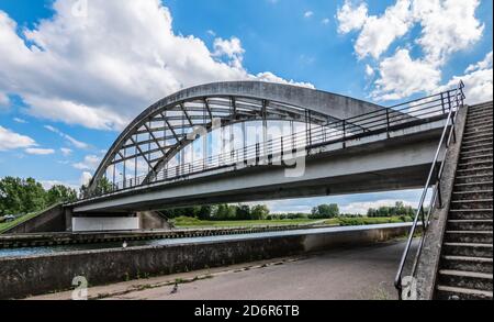Double concrete arch bridge over the Nete river in Zandhoven, Belgium. Stock Photo
