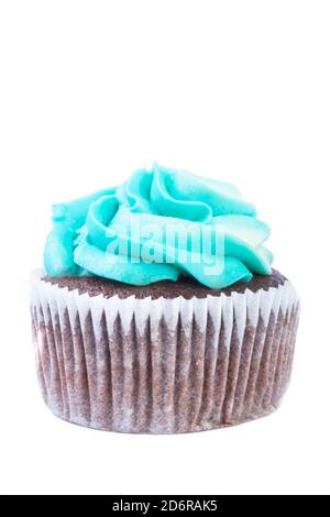 A chocolate cupcake or muffin with blue butter and cheese cream, holiday, party concept, greeting card Stock Photo