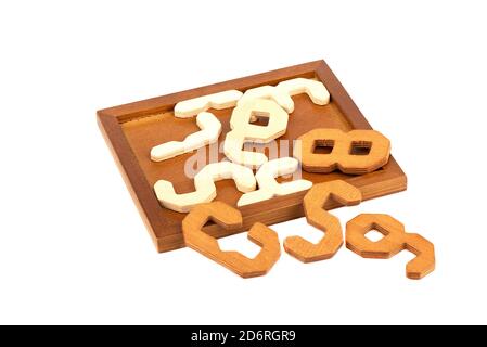 Disassembled 2D wooden puzzle Digital puzzle. The goal is to collect the items inside the rectangular box. Copy space. Stock Photo