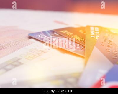 Credit cards, Set of color credit cards on wooden table. Stock Photo