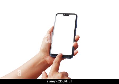 A woman uses her fingers to print on the screen of a modern mobile phone, isolated on a white background with clipping paths. Stock Photo