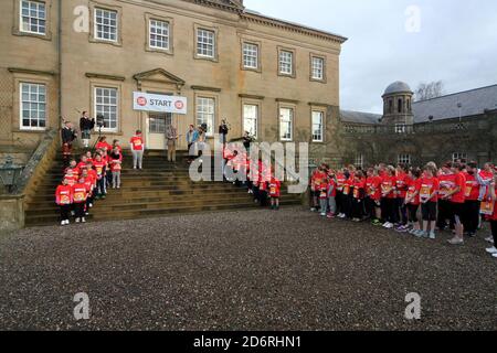 Dumfries House,Cumnock, East Ayrshire, Scotland, UK, Children from East Ayrshire School take part in  Sports Relief with BBC presenters Matt Baker & Alex Jones from the ONE show. The run was started by HRH Prince Charles Stock Photo