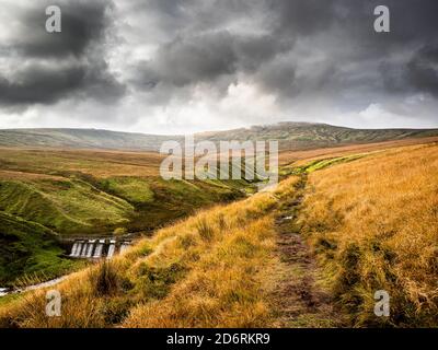 Open moorland with the view towards Little Whernside with small waterfall. Yorkshire Dales Stock Photo