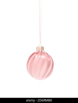 Pink twisted ribbed Christmas ball hanging on cord. Isolated on white background. Christmas decoration, festive atmosphere concept. Stock Photo