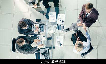 top view. working group discusses financial indicators. Stock Photo