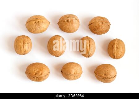 group of walnuts in shell on white background Stock Photo