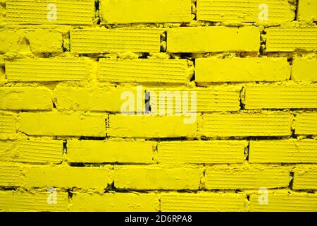 yellow brick wall for background and texture Stock Photo