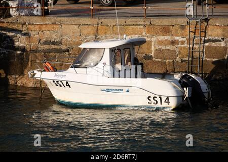 SS14 Small boat in Portreath Harbour, Cornwall, UK Stock Photo