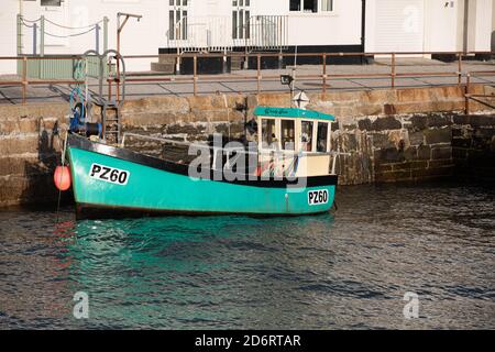 PZ60 Small boat moored in Portreath Harbour, Cornwall, UK Stock Photo