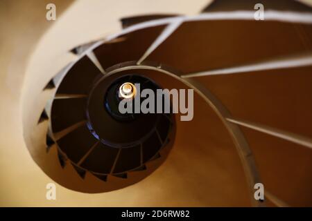 Spiral Staircase Inside of Architectural Building. Stairs Shaped in a Circle from Below. Stock Photo