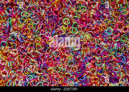 Lot of small and colored rubber bands for use as a background. Stock Photo