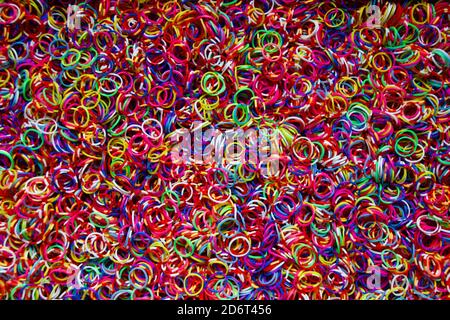 Lot of small and colored rubber bands for use as a background. Stock Photo