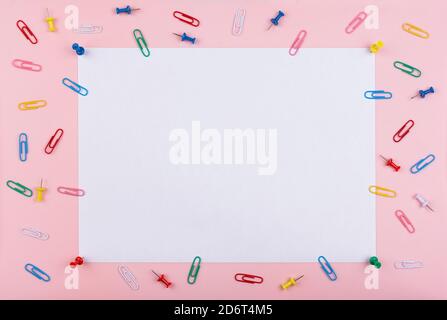 white sheet fastened with clerical multi-colored buttons Stock Photo