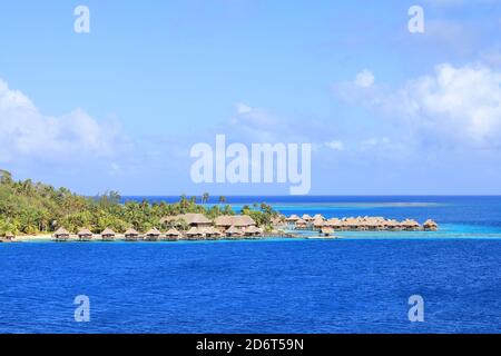 Overwater bungalows on Bora Bora island, French Polynesia, South Pacific Ocean. Stock Photo
