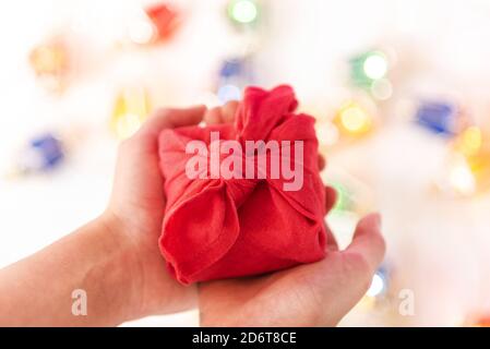 Presents on New Year or Christmas holiday, garland Stock Photo